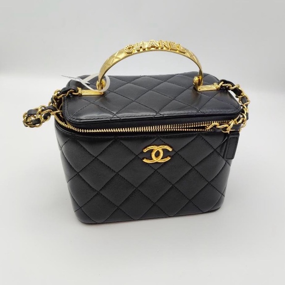 CHANEL Handbags - Chanel Jewelled spellout Bangle top handle Black Quilted Lambskin Vanity Bag